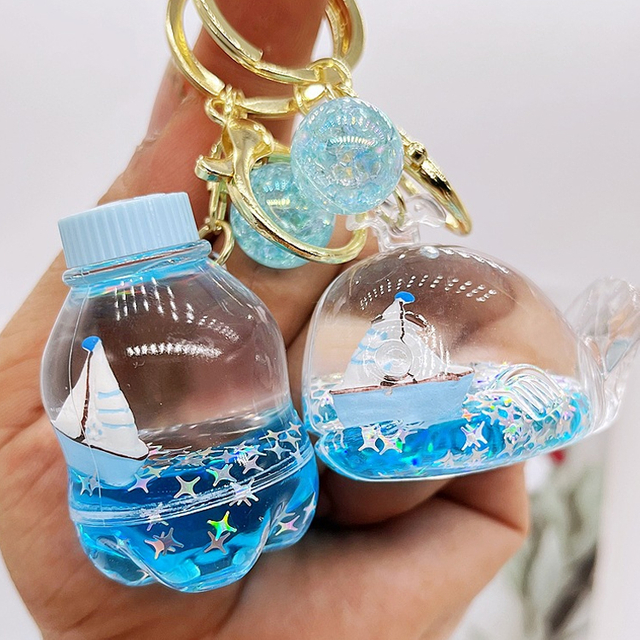 Wholesale Acrylic Plastic Cartoon Beach Nautical Drift Bottle Keychain Tourist Souvenir Sailboat Liquid Oil Ocean Keychain