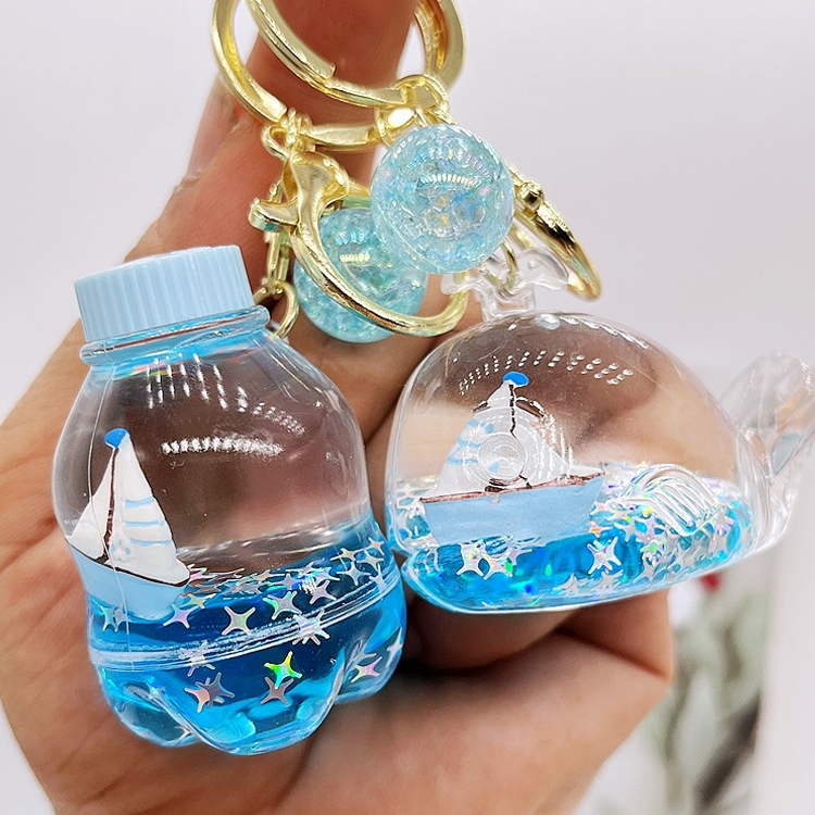 Wholesale Acrylic Plastic Cartoon Beach Nautical Drift Bottle Keychain Tourist Souvenir Sailboat Liquid Oil Ocean Keychain