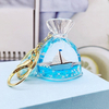 Wholesale Acrylic Plastic Cartoon Beach Nautical Drift Bottle Keychain Tourist Souvenir Sailboat Liquid Oil Ocean Keychain